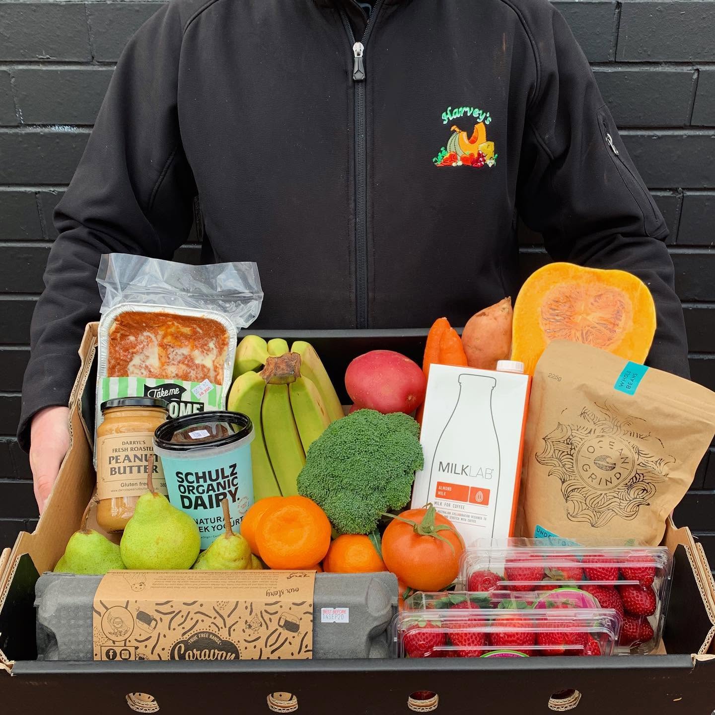 A Harveys grocery box filled with fresh produce and local favourites